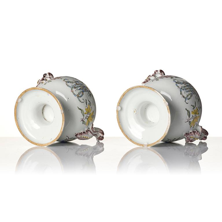 A pair of fainece potpurri jars with covers, Northern Europe, 18th century.