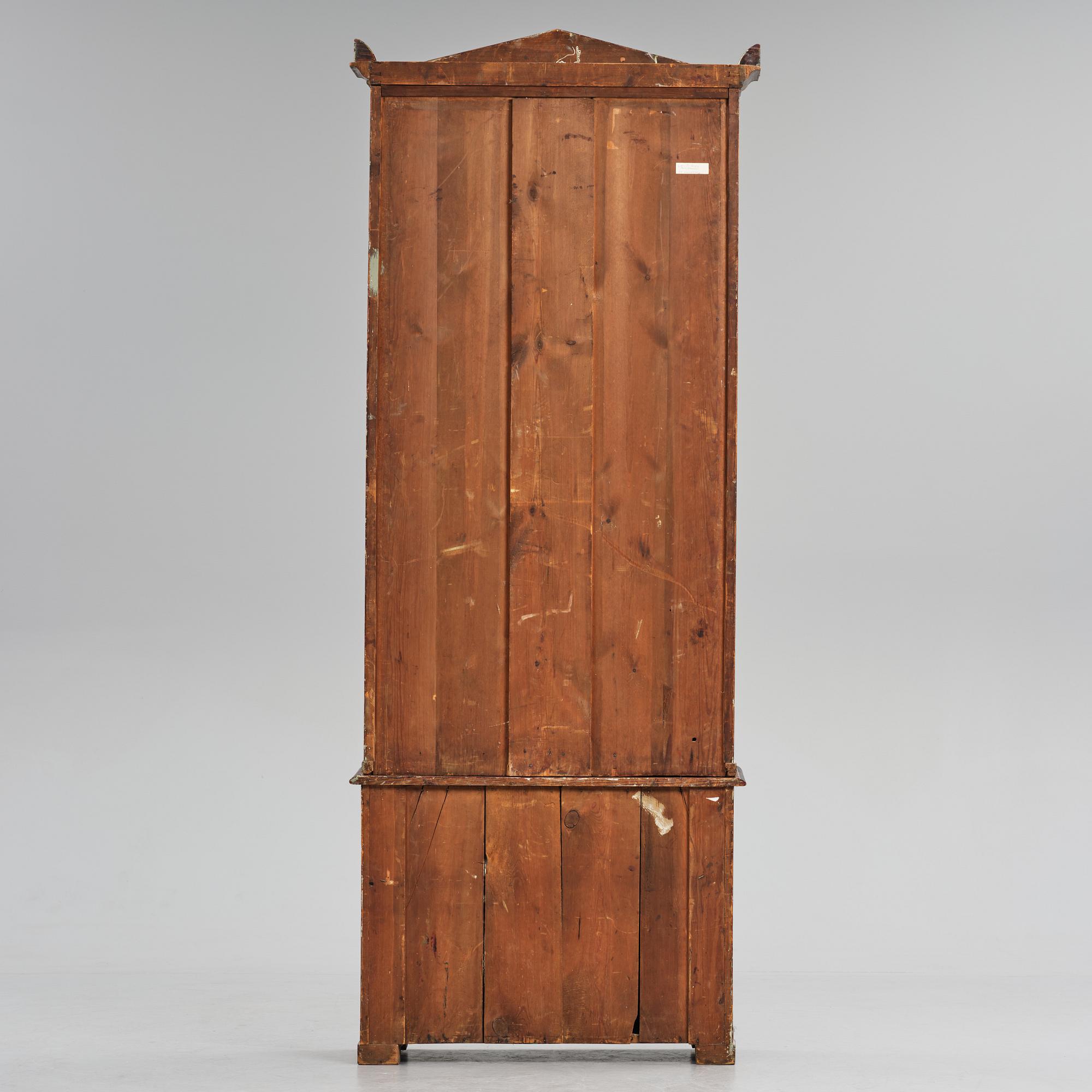 A Swedish faux-boix neo-gothic book cabinet, ca 1830.