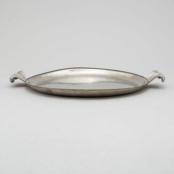 A pewter plate from Svenskt Tenn, Stockholm, 1930.