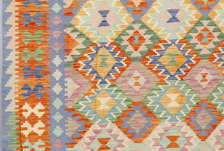 A Kilim carpet, approx. 393 x 296 cm.