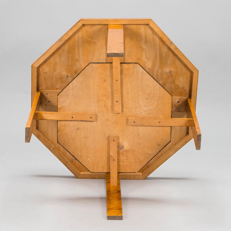 A 1920s Carelian birch veneered table.