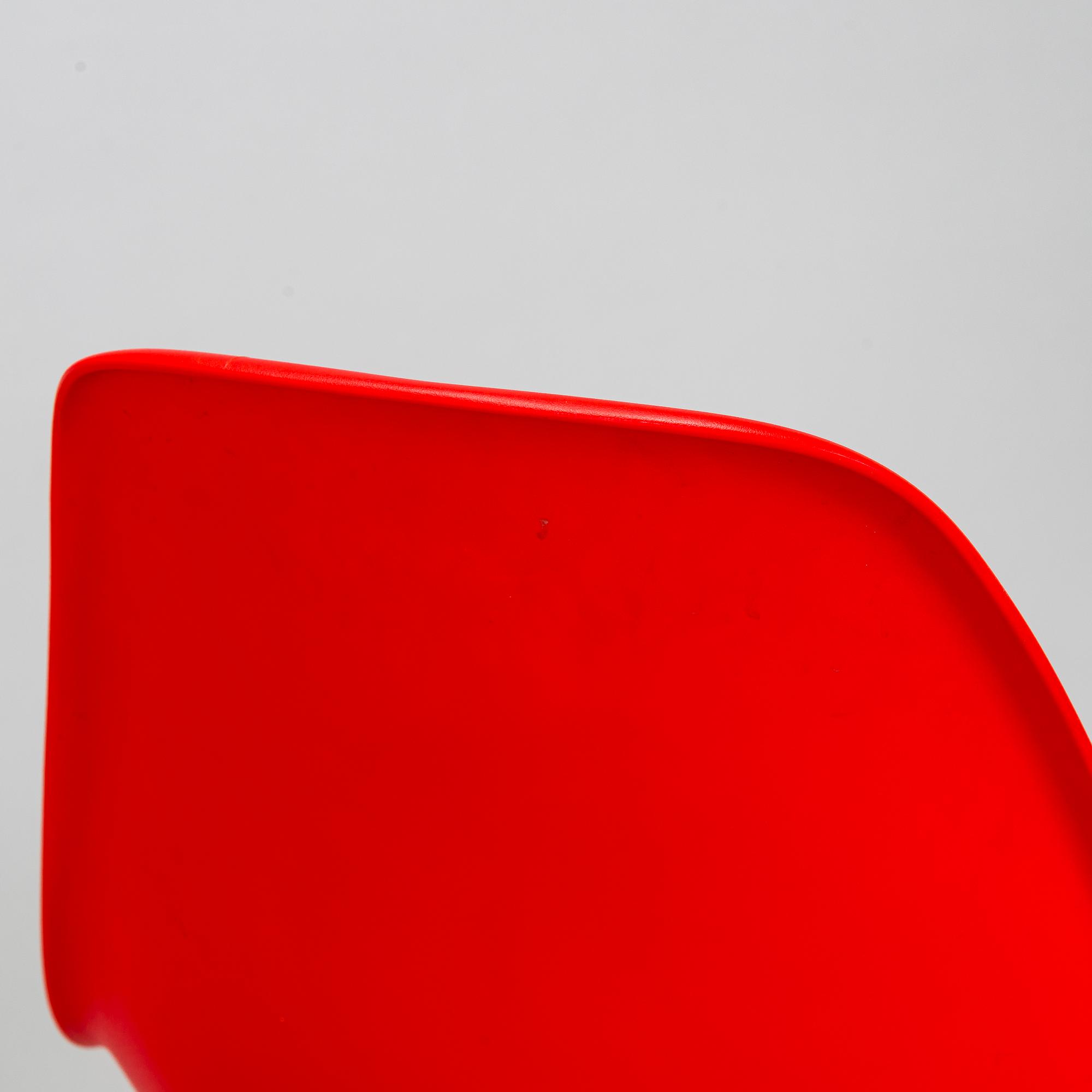Charles & Ray Eames, two 'Plastic Chair DSW' chairs, Vitra.