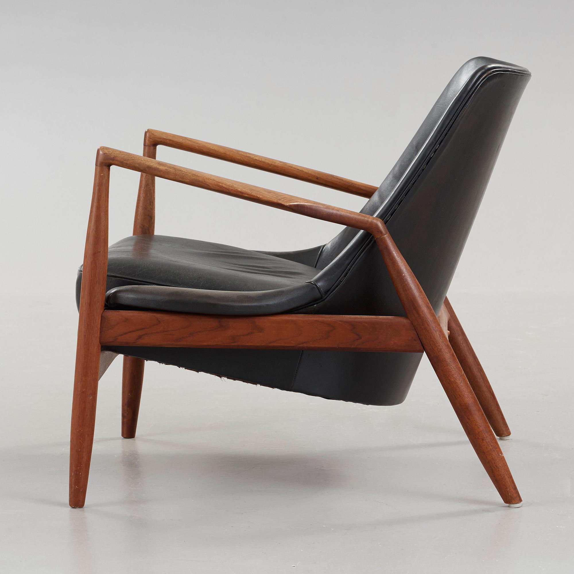 Ib Kofod-Larsen, a 'Seal' teak and black leather armchair, Olof Persson Möbler, Jönköping, Sweden 1950's-60's.
