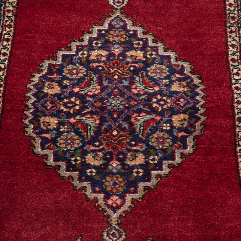 A runner, Tabriz probably, signed, ca 193 x 70 cm.