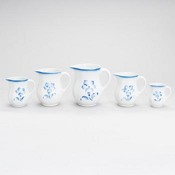 A set of five ceramic milk jugs by Arabia, Finland 1930s-40s.