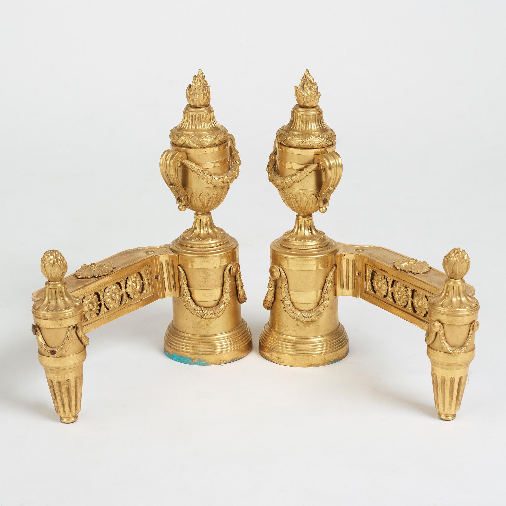 A pair of Louis XVI 18th Century bronze chenets.