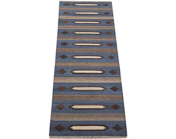 A Kilim runner, c. 226 x 70 cm.