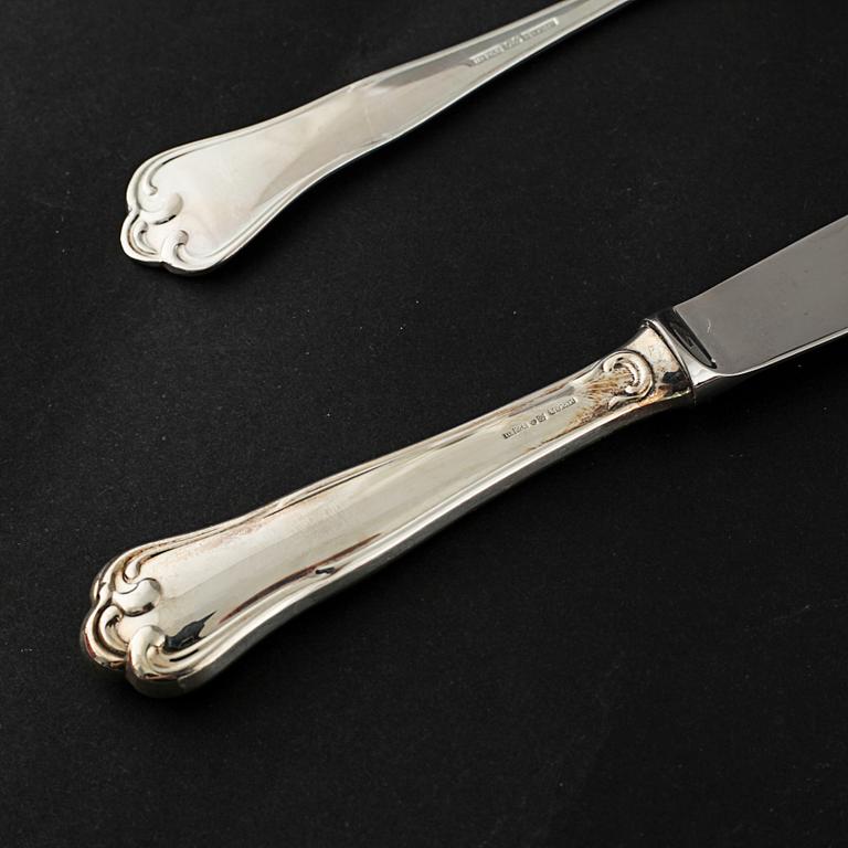 A silver set of table ware of 47 pcs by MEMA, from the late 20th century.