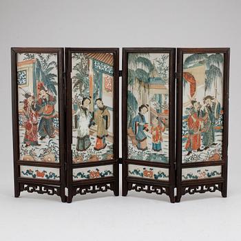 A Chinese glass painting, four sections, early 20th century.