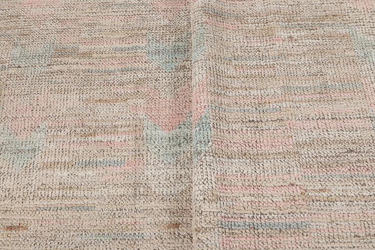 A Moroccan carpet, c. 363 x 284 cm.