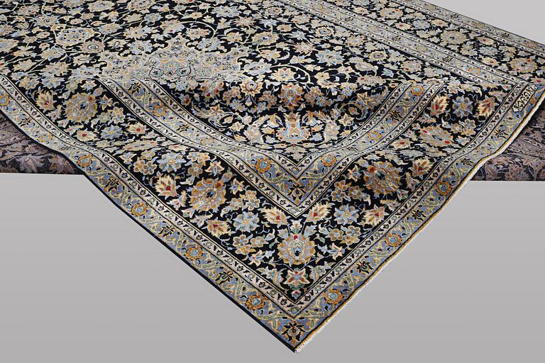 A carpet, Kashan, ca 405 x 295 cm.