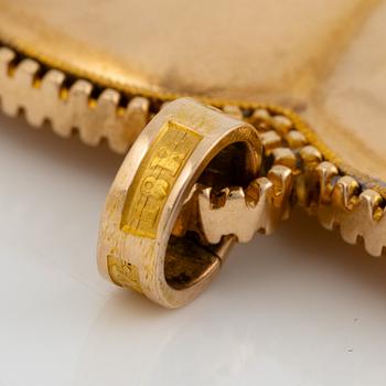 Heart locket, 18K gold with glass.