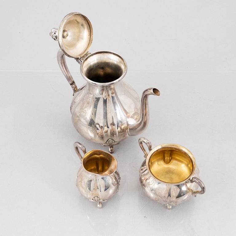 A 3-piece Swedish silver coffee service and a tray, including GAB, Stockholm 1959.