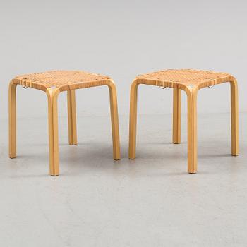 A pair of 1950s / 60s Alvar Aalto Y 61 stools.