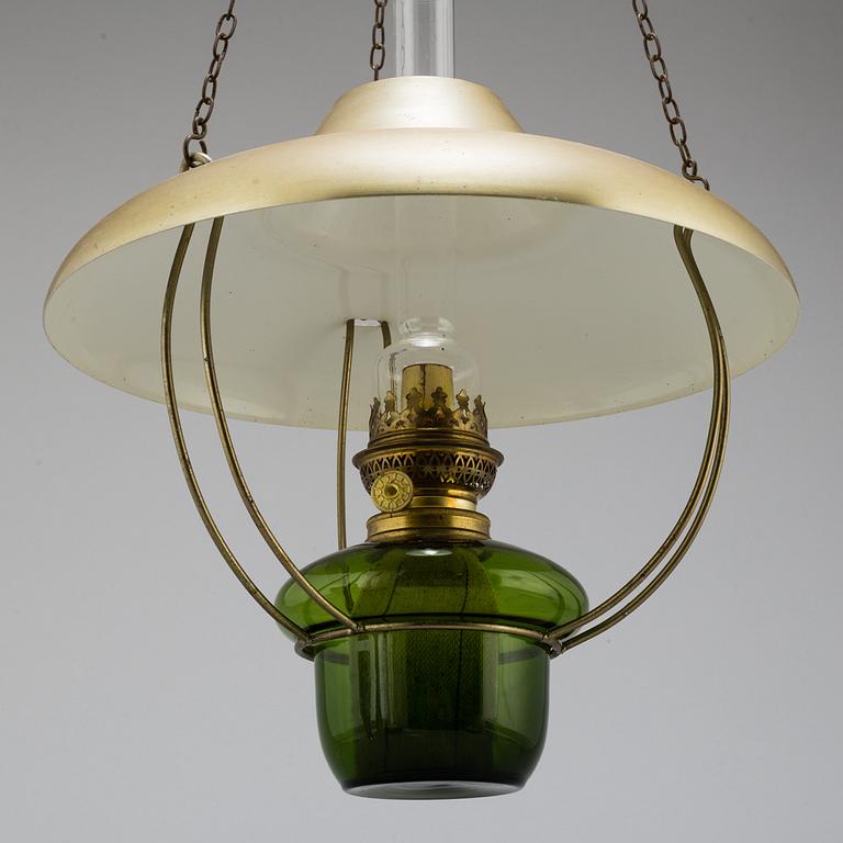 a paraffin ceiling light, brass and glass.