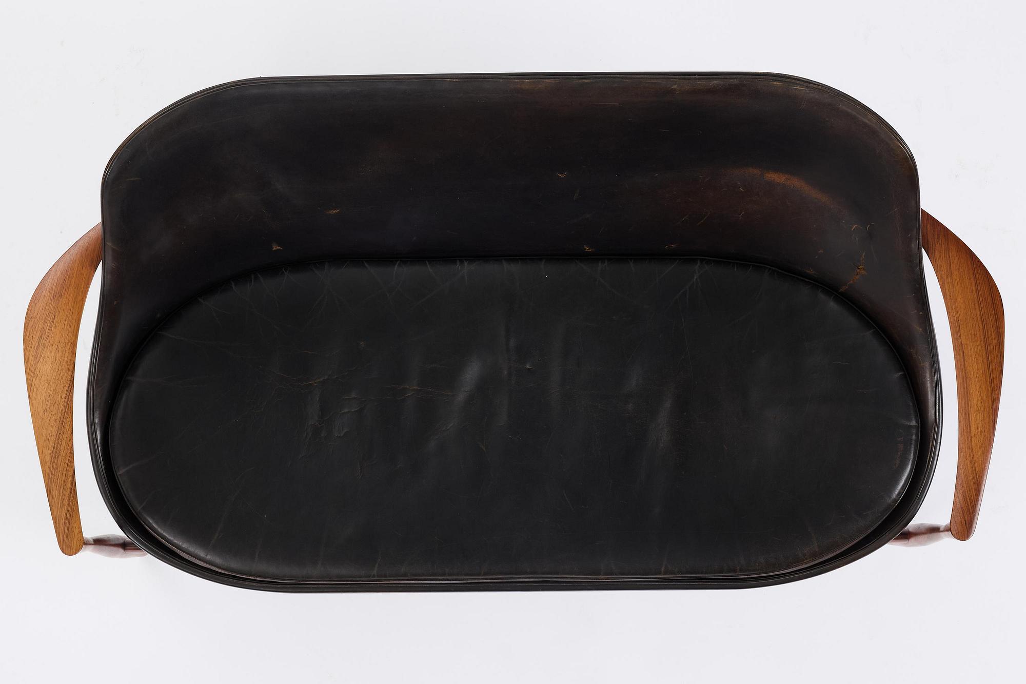 Ib Kofod-Larsen, a rosewood "Elizabeth" sofa, cabinetmakers Christensen & Larsen, Denmark, 1950s-60s.