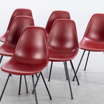 A set of six CHARELS AND RAYE EAMES DSX chairs.