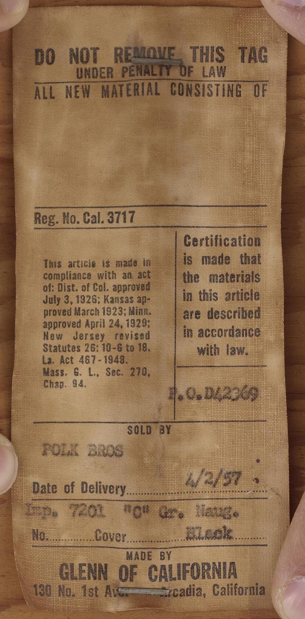 A pair of Greta Magnusson Grossman walnut and artificial leather chairs, for Glenn of California, USA 1950's.