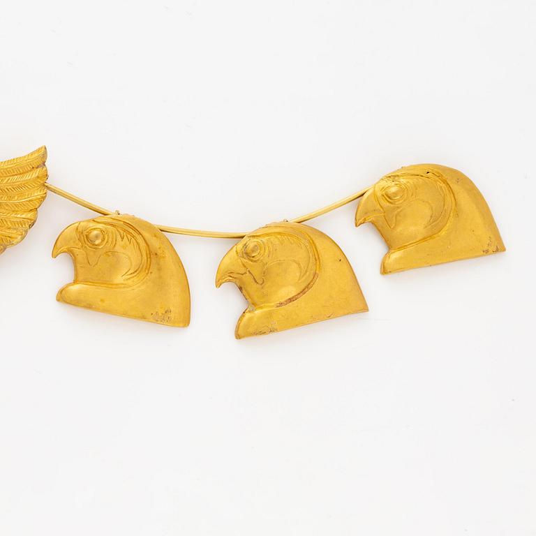 A modern Egyptian-style gold necklace.