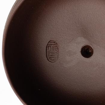 A group of three Chinese yixing teapots, 1960-80s.