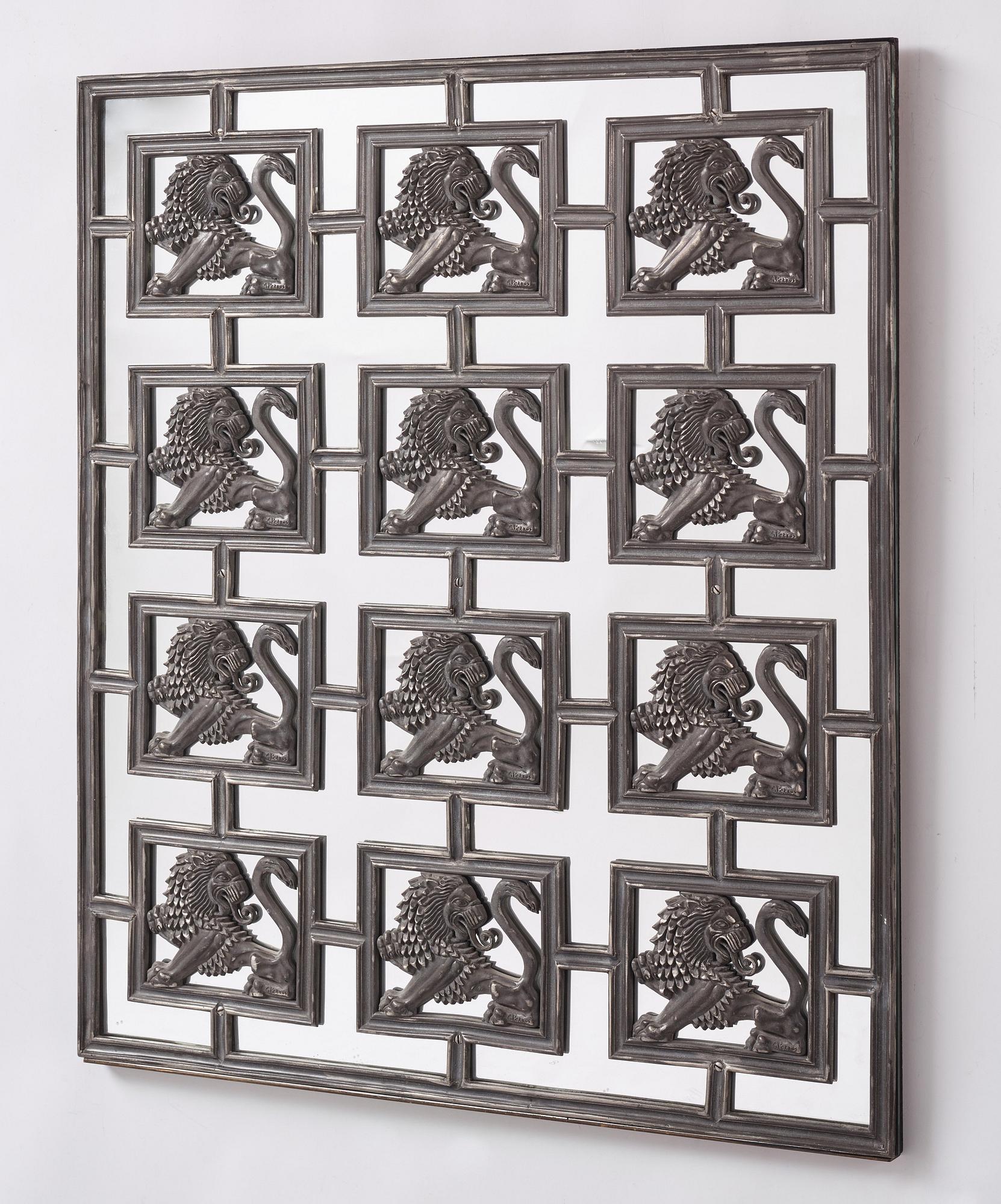 Uno Åhrén & Anna Petrus, a pewter mirror,  Svenskt Tenn, Stockholm, model 516, designed in 1927.