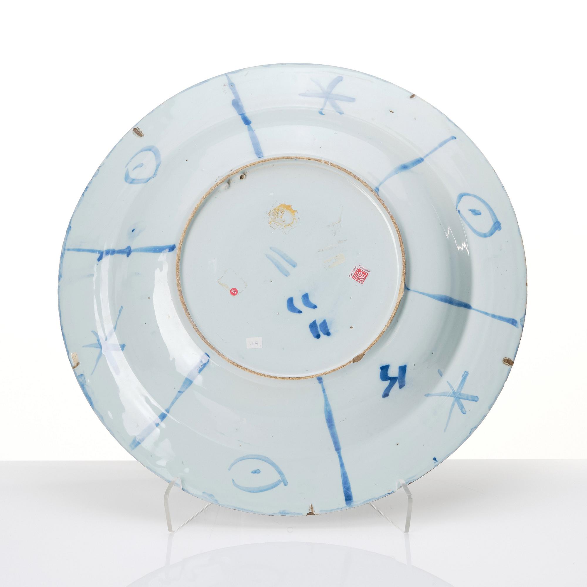 A large Dutch Delft faience charger, late 17th Century.