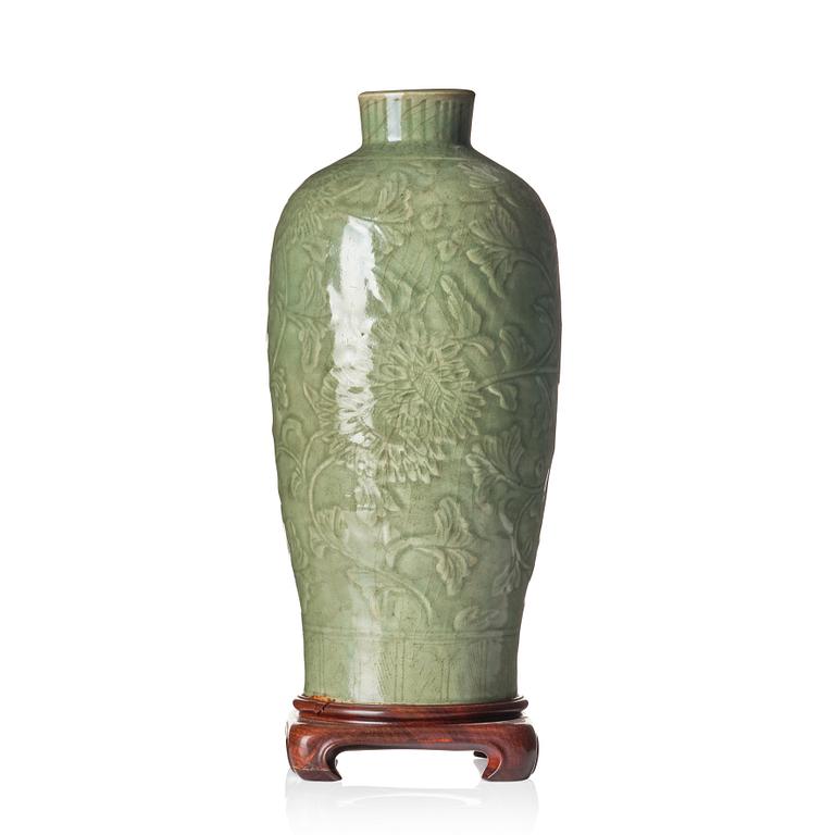 A carved celadon 'longquan' vase, Yuan/Ming dynasty.