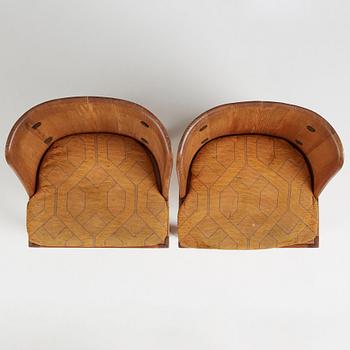 Axel Einar Hjorth, a pair of stained pine 'Lovö' chairs, Nordiska Kompaniet, Sweden 1930s.