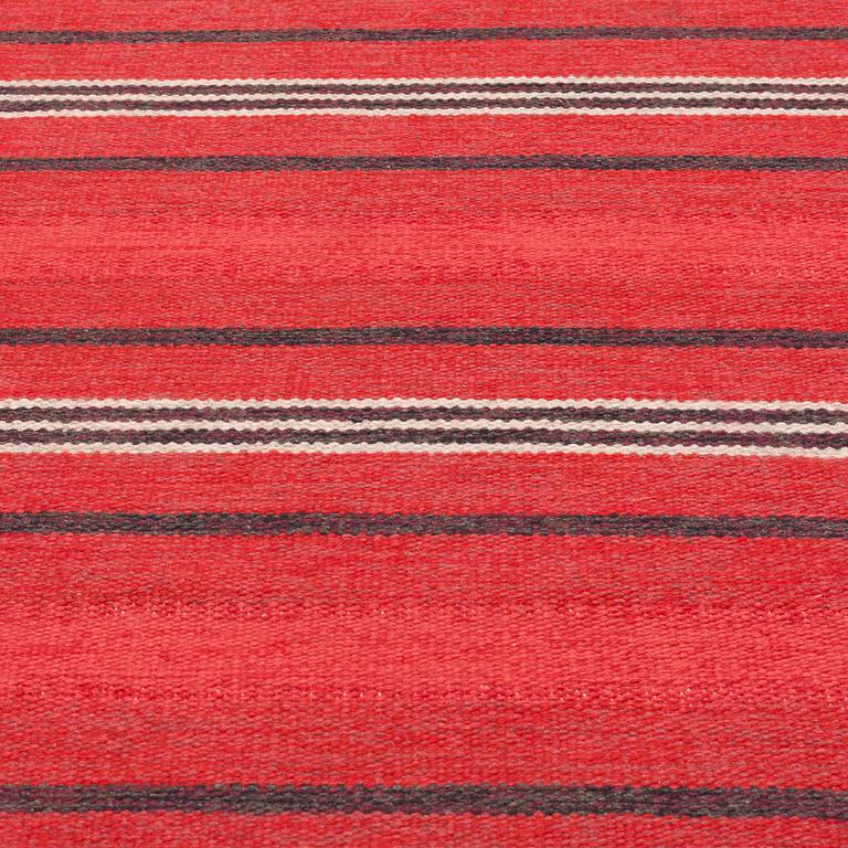 A CARPET, flat weave, around 285 x 151 cm.