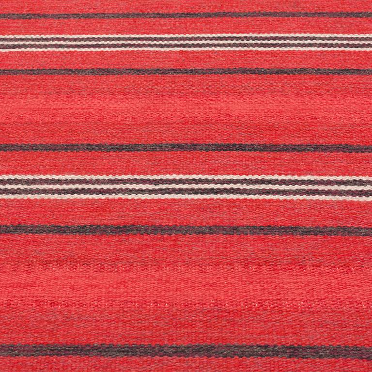 A CARPET, flat weave, around 285 x 151 cm.