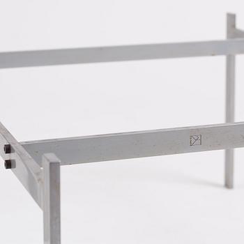 Poul Kjaerholm, a black stone top 'PK61' table, edition E Kold Christensen, Denmark.