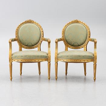 A pair of armchairs, Gustavian style, early 20th century.