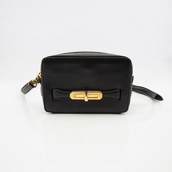 Alexander McQueen, "Camera Bag" purse.