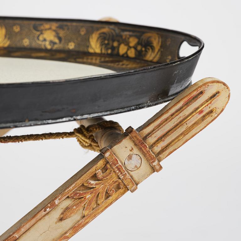 A tole-peinte Empire tray, first part 19th century on a later stand.