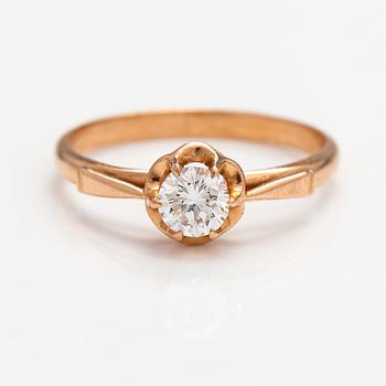 A 14K gold ring with a ca. 0.48 ct diamond. Soviet union.