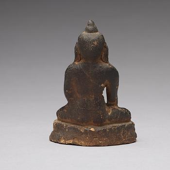 A seated clay figure of Amithaba buddha, Tibet/Nepal 18/19th Century or older.