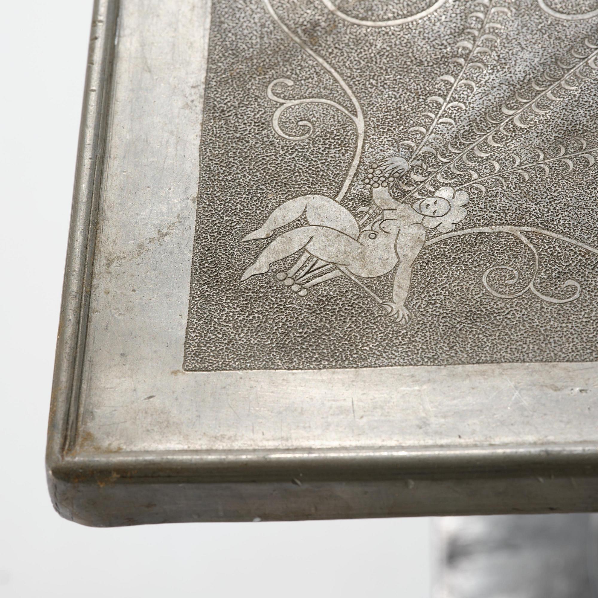 Anna Petrus, a pewter top tray table on a base by Uno Åhrén, executed in her studio, Stockholm, ca 1922-25.