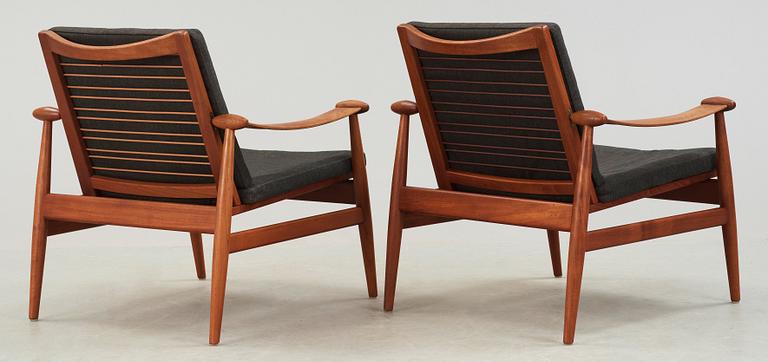 A pair of Finn Juhl teak easy chairs, France & Daverkosen, Denmark.