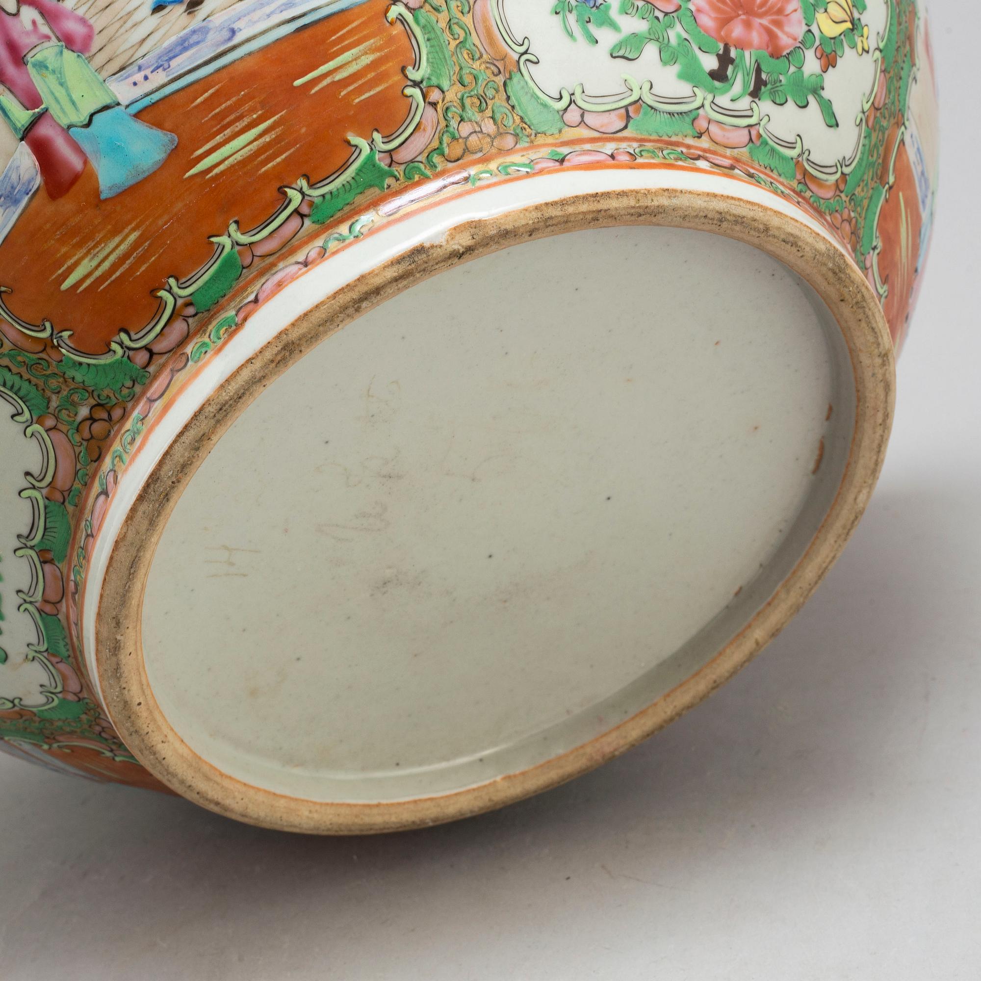 A famille rose 'Canton' punch bowl, Qing dynasty, late 19th century.