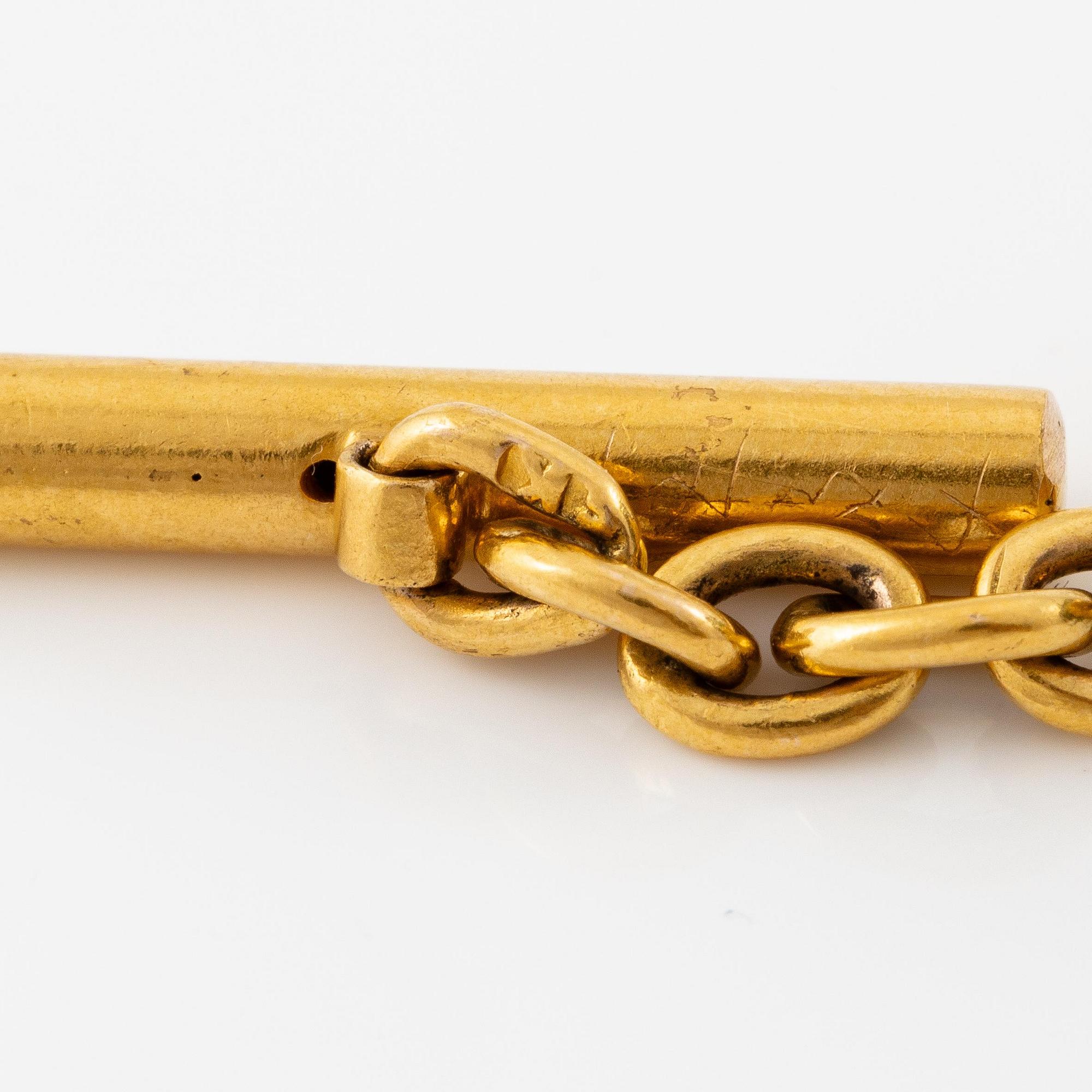 A pair of cufflinks in 14K gold and nephrite, Erik Kollin St Petersburg.