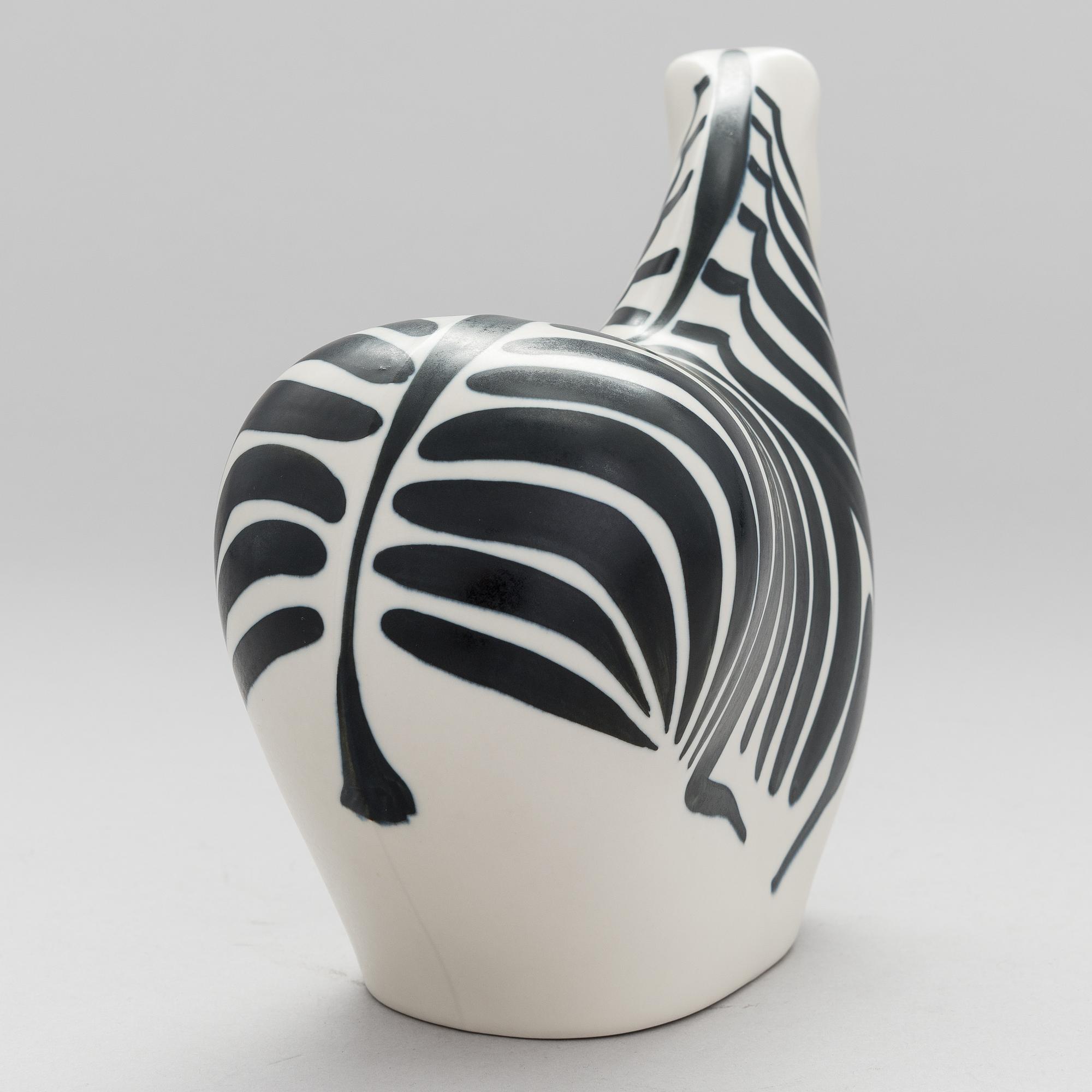 A STONEWARE FIGURINE by LILLEMOR MANNERHEIM, signed Lillemor Arabia -85.