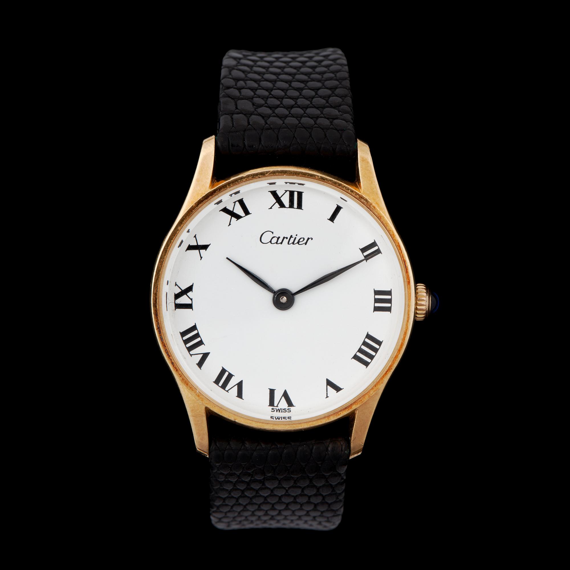 Cartier. Guld. Manuell. Ø 31 mm. ca 1978.