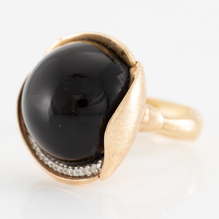 Ole Lynggaard, ring, large Lotus, 18K gold with cabochon-cut black stone probably onyx with brilliant-cut diamonds.