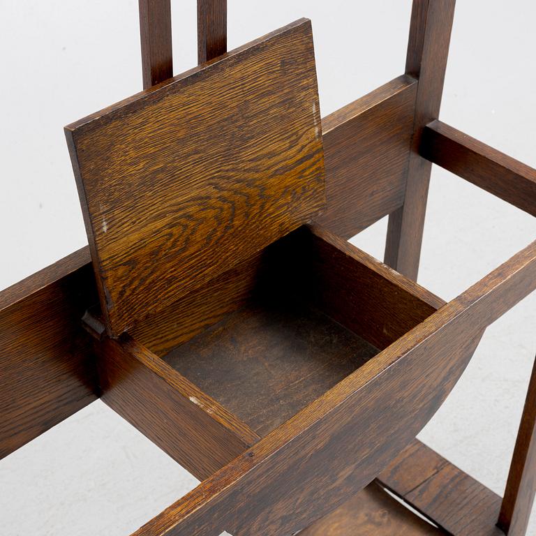 An oak coat hanger and umbrella stand, Early 20th century.