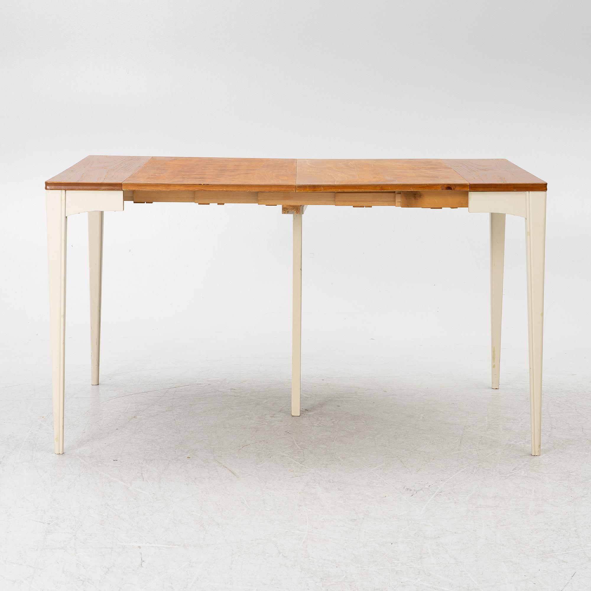 A dining table, mid-20th century.