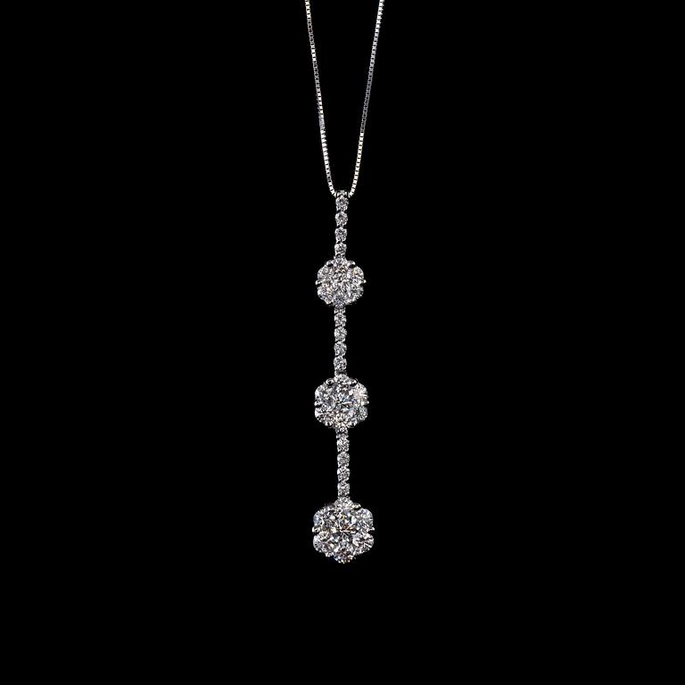 RIIPUS, briljanttihiottuja timantteja n. 1.22 ct. 18 K valkokultaa. Paino 4,2 g.
