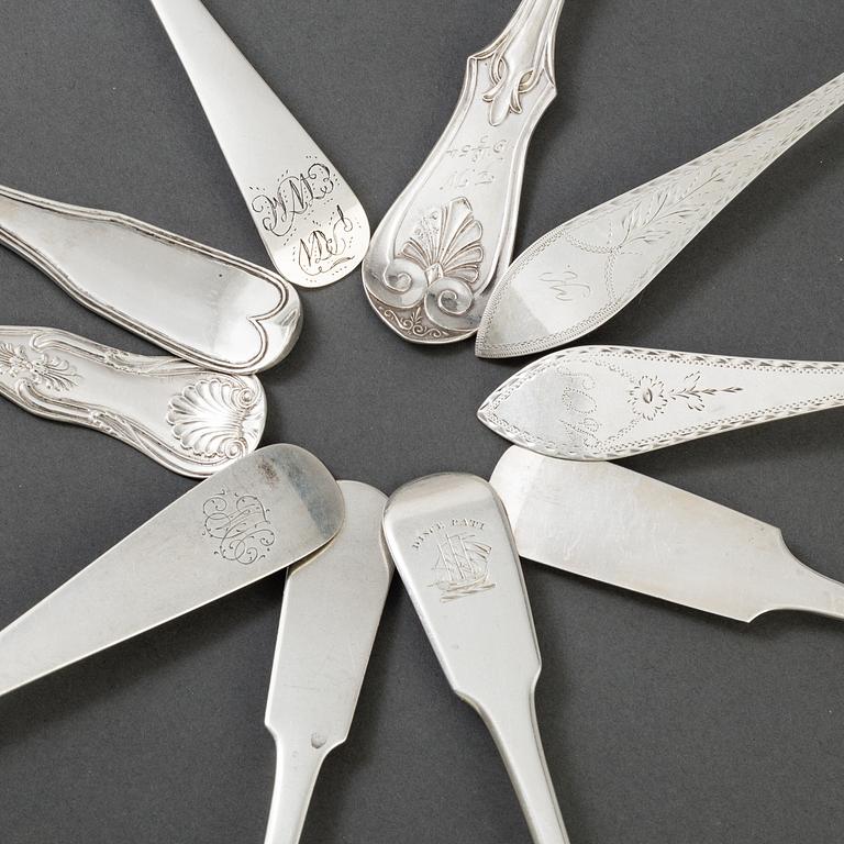 A set of 10 different spoons of different nationalities.