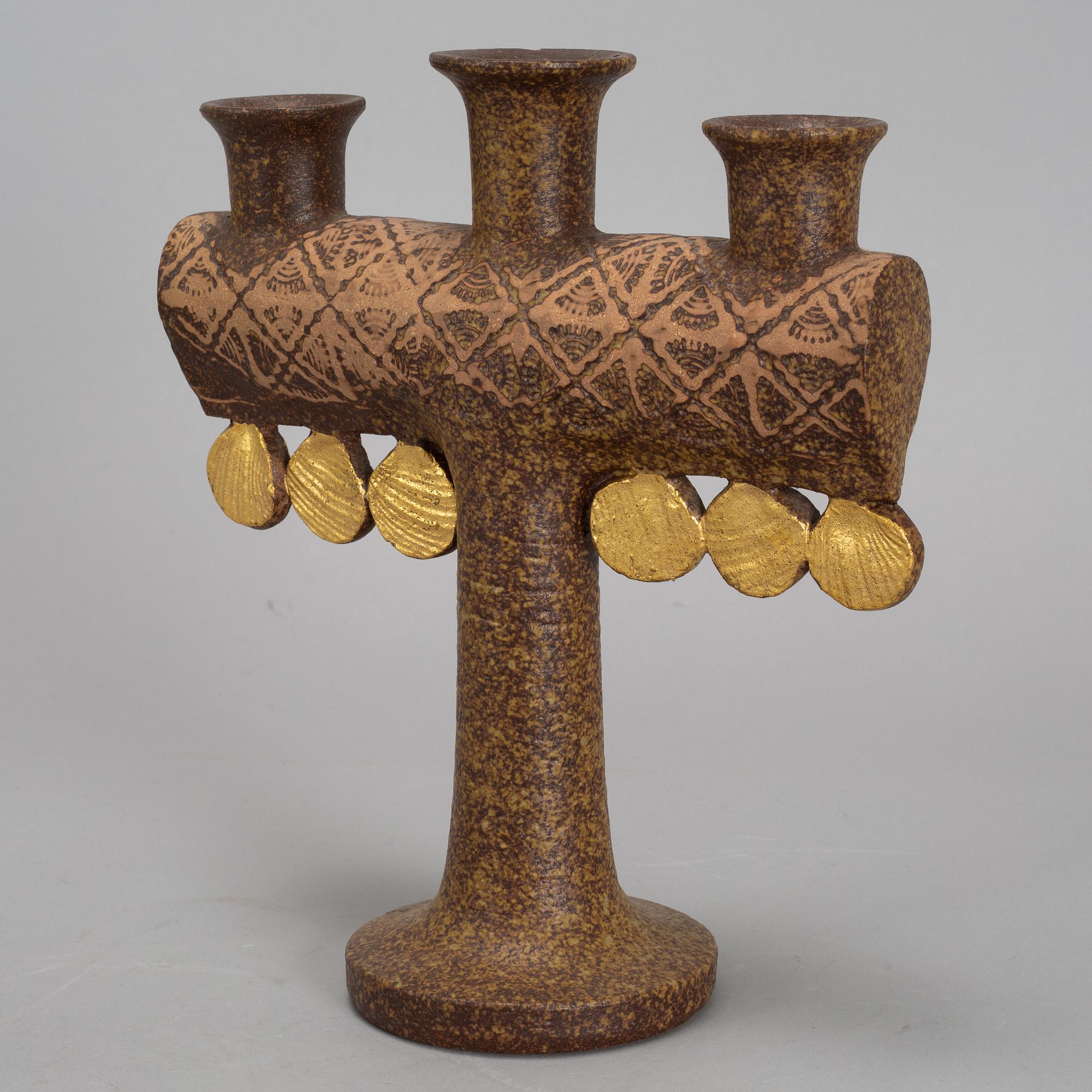 LISA LARSON, a stoneware candelabra and a figurine. Gustavsberg.