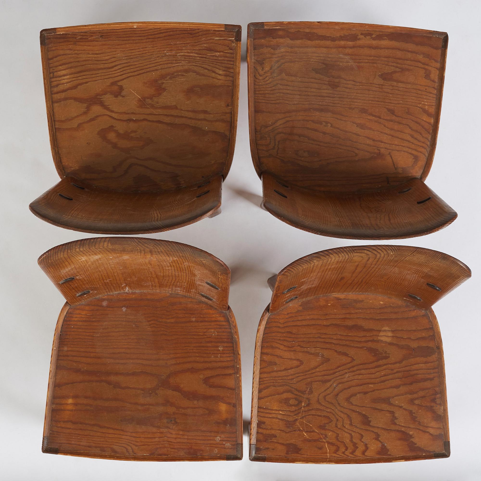 Axel Einar Hjorth, a set of four "Lovö" stained pine chairs, Nordiska Kompaniet 1930s.