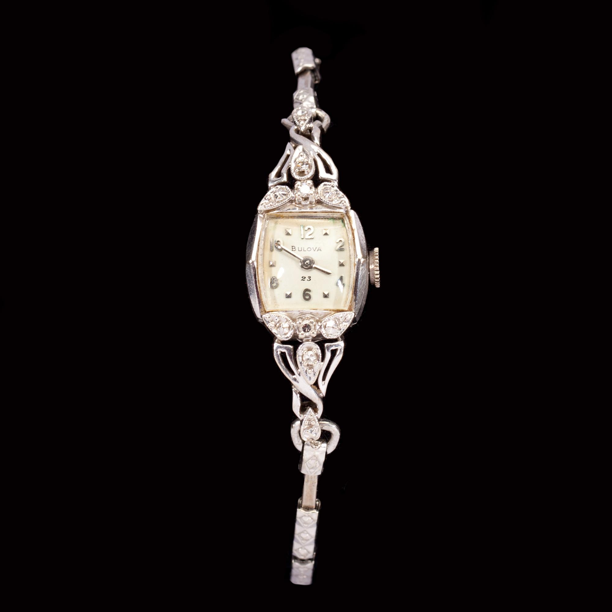 DAMARMBANDSUR, 14k besatt med små diamanter, Bulova. 1900-tal.
